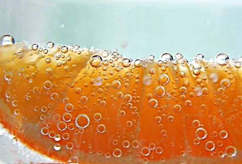 orange slice in seltzer water