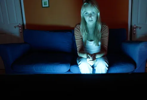 Woman Watching TV at Night