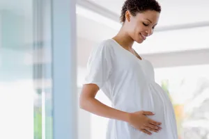 photo of pregnant woman standing
