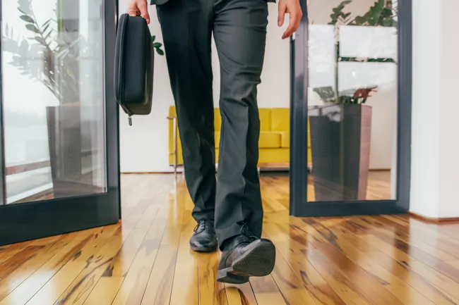 photo of businessman walking