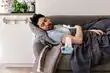 man on sofa sick with flu