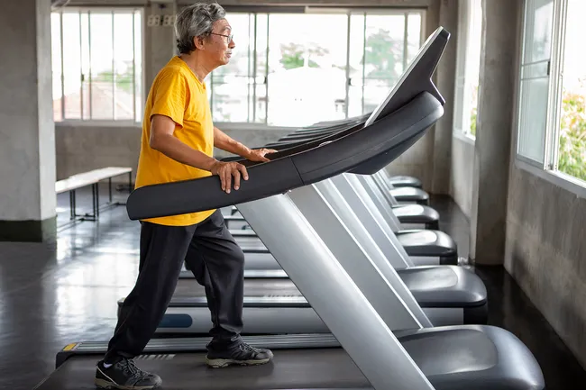 photo of mature man on treadmill