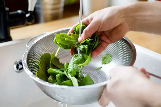 photo of washing spinach