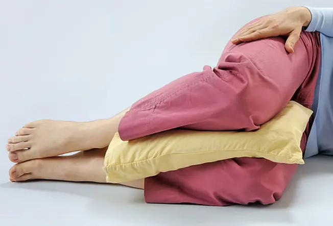 4. Try a Leg Pillow for Back Pain