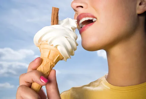 Woman Enjoying Ice Cream Cone