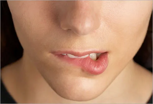 Woman Biting Lip