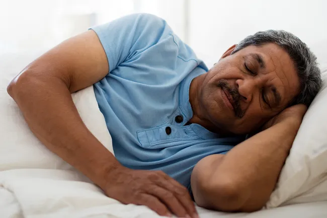 photo of mature man sleeping