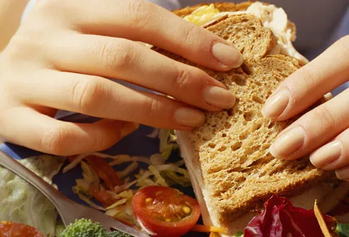 Woman Eating Healthy Sandwich