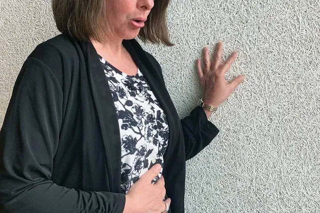 woman breathing through panic attack