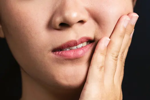 woman with sore jaw close up
