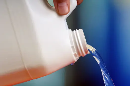 photo of pouring bleach