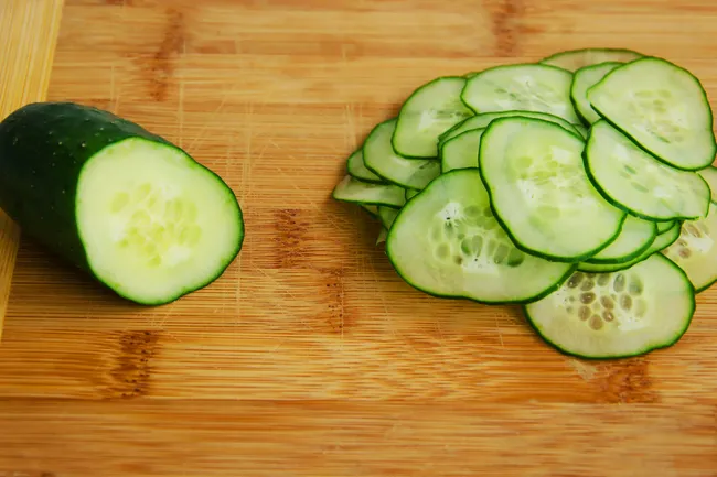 photo of cup of cucumbers