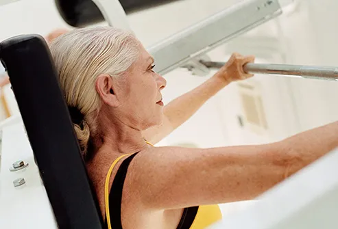 mature woman lifting weights