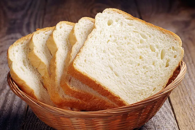 photo of basket of white bread