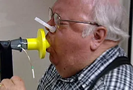 man doing lung test