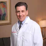 Dr. Alan H. Slater, MD