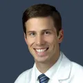 Dr. Curtis Henn, MD