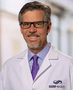 Dr. Mark Dickinson