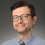 Dr. Joshua E Motelow, MD, PhD