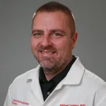 Dr. Michael F Csompo, MD - Hollis, NY - Gynecologist