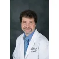 Dr. Johnny M. Belenchia, MD