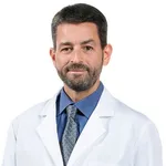 Dr. T. Ryan R. Palmer, MD