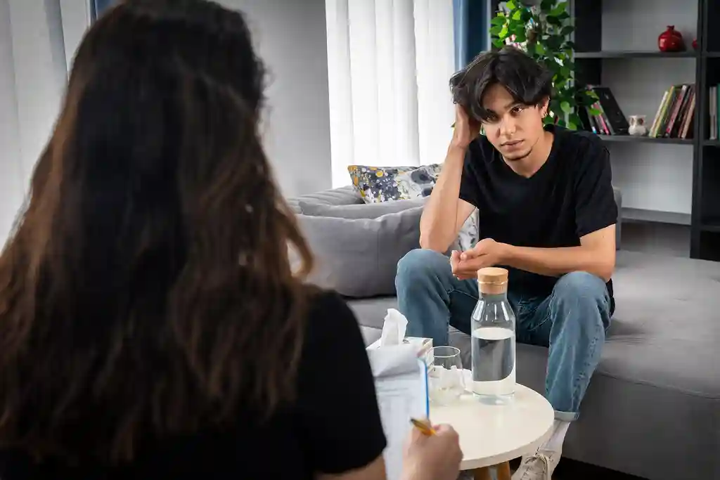 photo of teenager having psychotherapy session