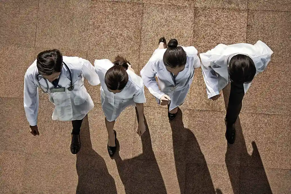 photo of doctors walking outdoors