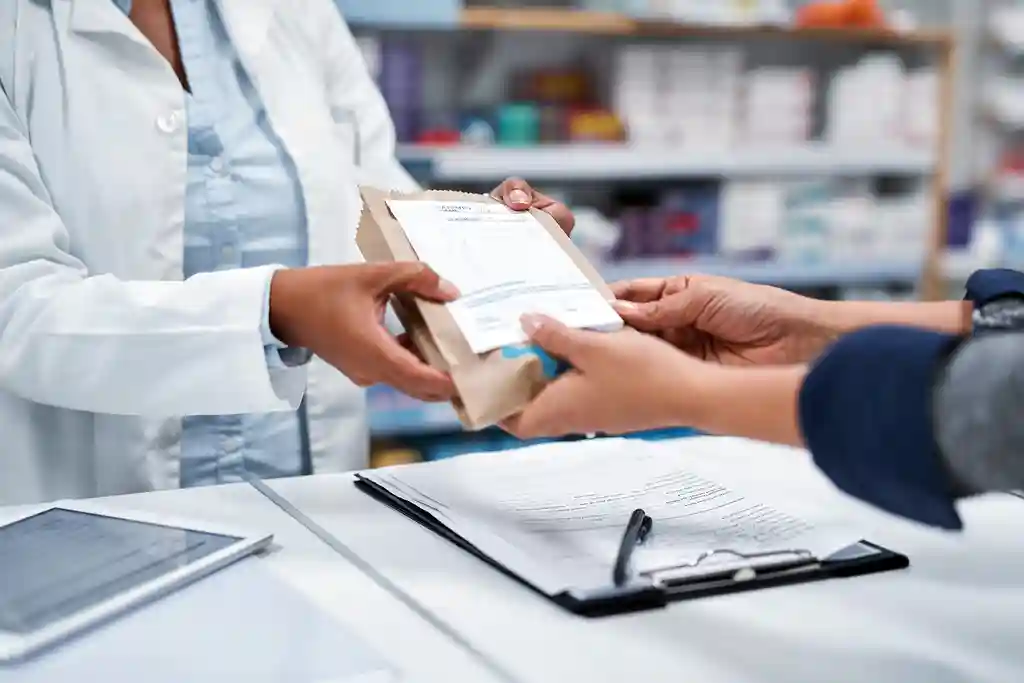 photo of pharmacist helping customer