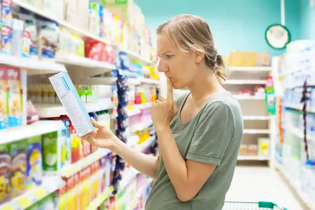 woman concerned food label