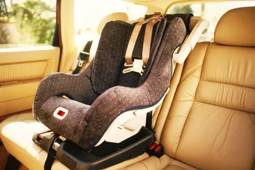 photo of child's seat in hot car