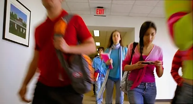 teens in school hallway
