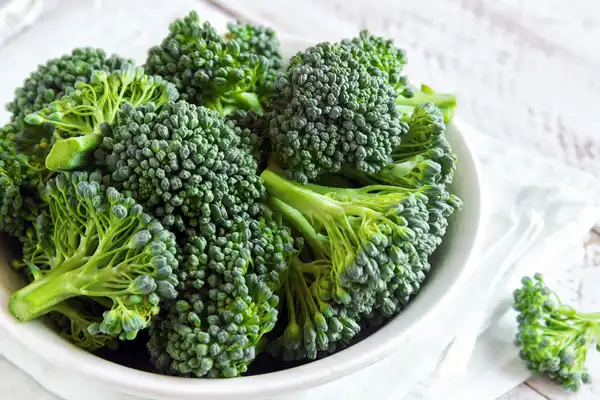 photo of bowl of broccoli close up