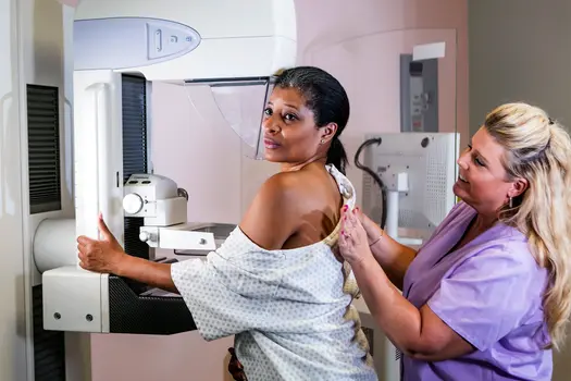 photo of woman getting a mammogram