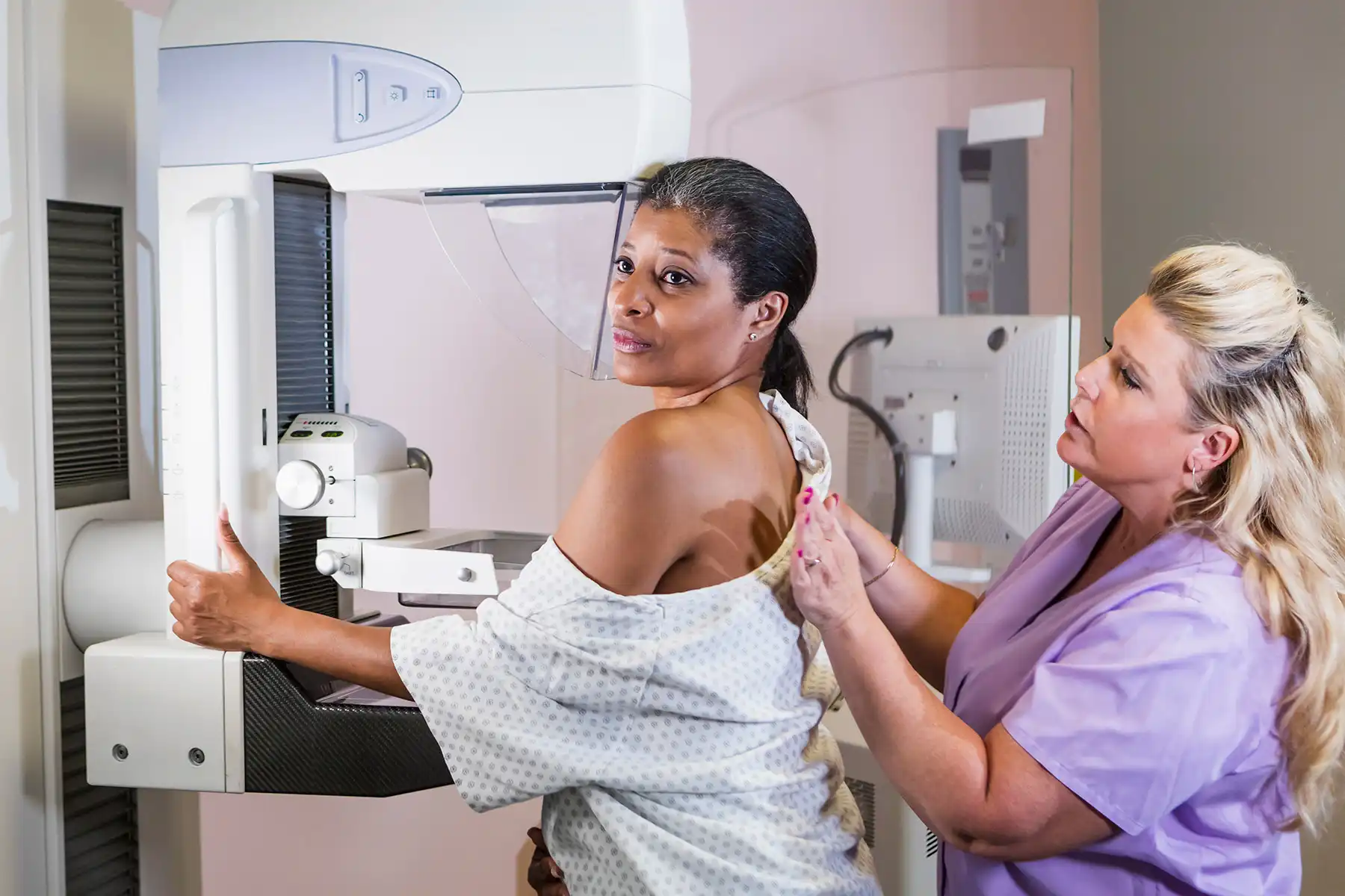 photo of mature woman getting mammogram
