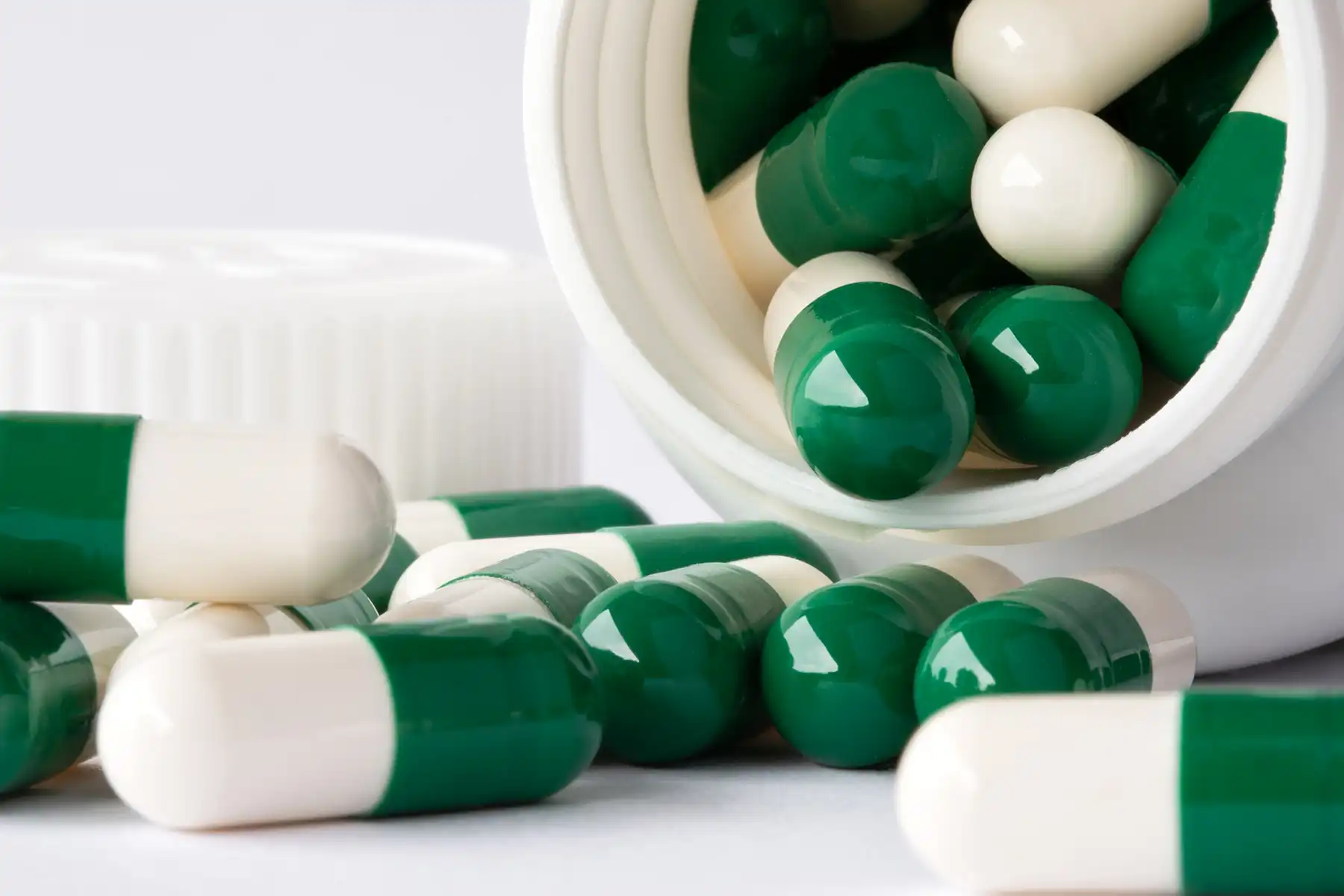 photo of green and white prescription pills