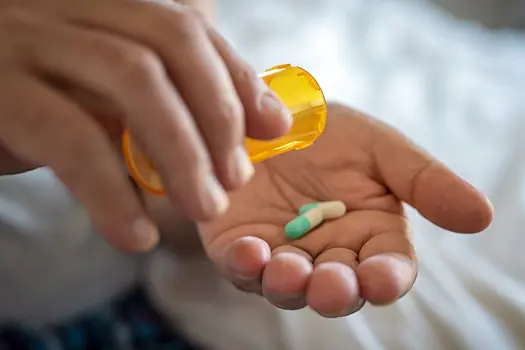 photo of prescription pills in hand