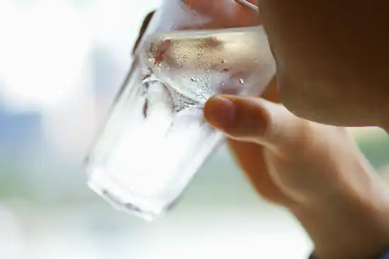 photo of drinking glass of water close up