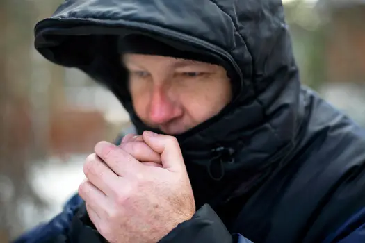 photo of man bundled up in winter