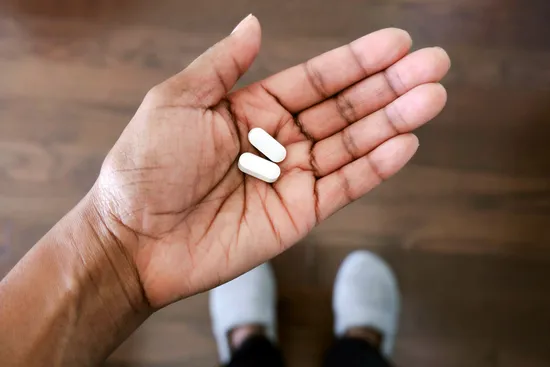 photo of pills in hand