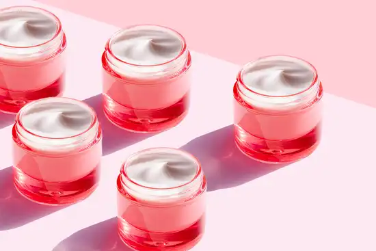 photo of jars of moisturizing cream